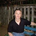 николай